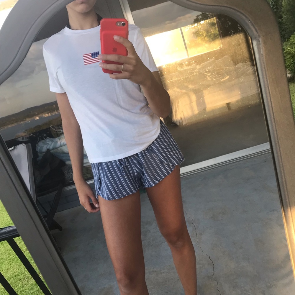 White shirt sleeve top with American flag